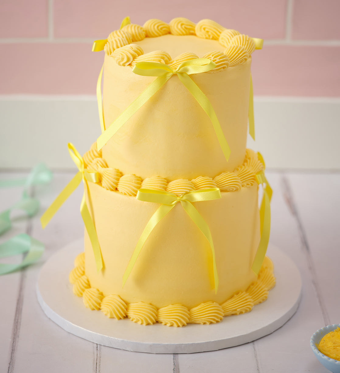 Yellow Mini Two Tier Ribbons and Ruffles Cake